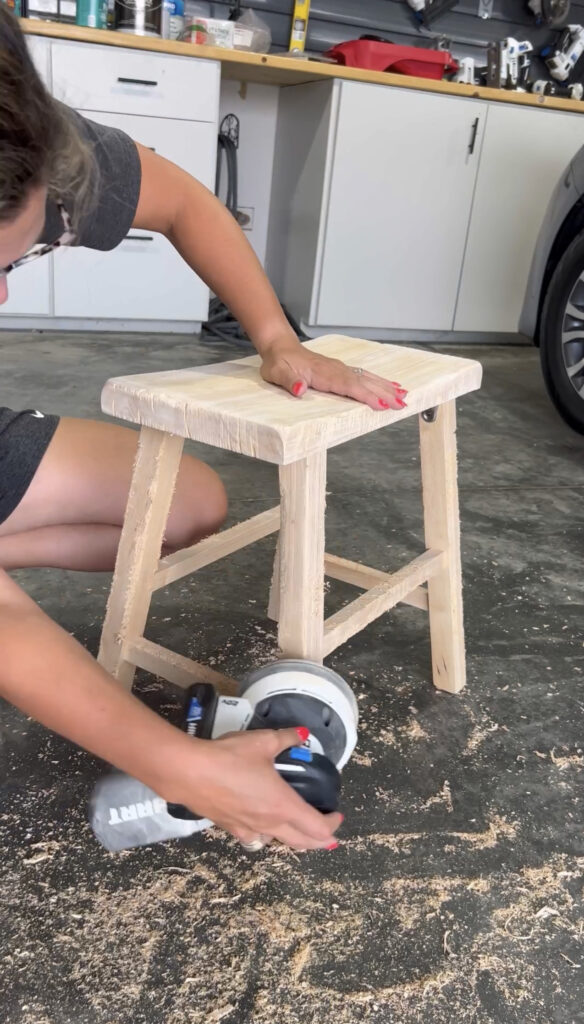 Sanding the stool